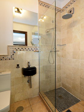 En suite shower room to the above bedroom