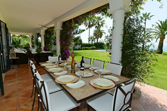 Enjoy the warm sea breeze while dining on the terrace at La Calma