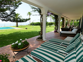 There are plentiful sunbeds to relax on at La Calma