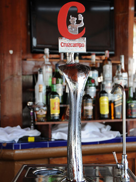 Enjoy a cold beer at the restaurant at Dominion Beach, Estepona