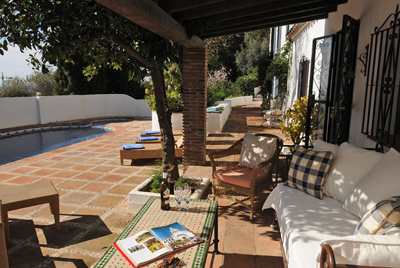Relax in the shade by the pool at Los Gemelos holiday villa, Mijas